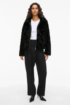 Abrigo efecto pelo con cremallera