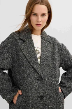 Abrigo espiga hombro ca&iacute;do