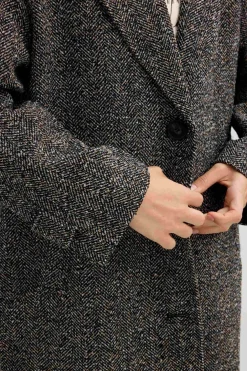 Abrigo espiga hombro ca&iacute;do