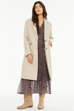 Abrigo largo bolsillos