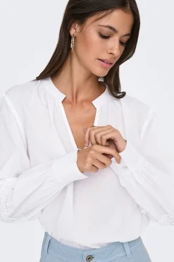 Blusa manga larga bordada