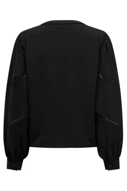 Blusa manga larga bordada