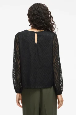 Blusa manga larga con cuello redondo