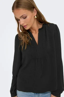 Blusa manga larga fluida