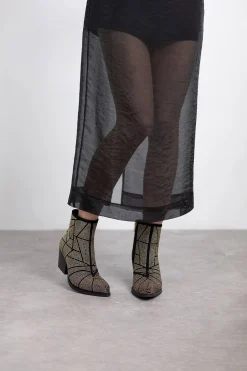 Botín cowboy tachas