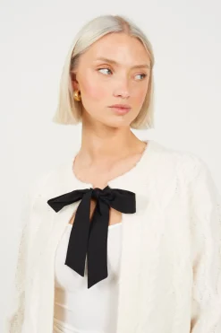 C&aacute;rdigan de punto con lazos