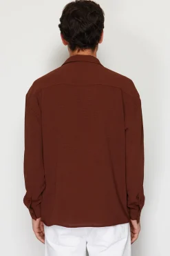 Camisa flu&iacute;da manga larga