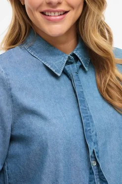 Camisa vaquera con lazada en el cuello