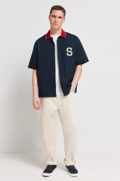 Camisa varsity manga corta