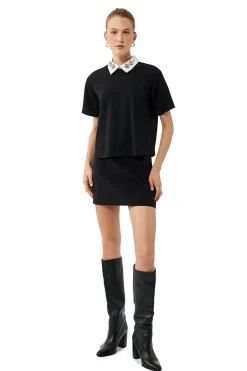 Camiseta con detalle de pedrer&iacute;a