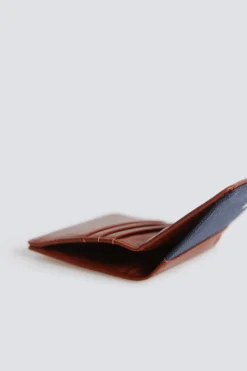 Cartera canvas y efecto piel