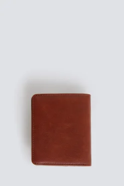 Cartera canvas y efecto piel