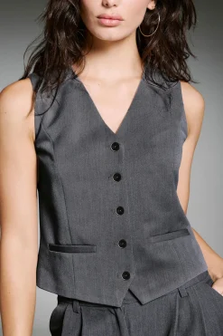 Chaleco de vestir con botonadura