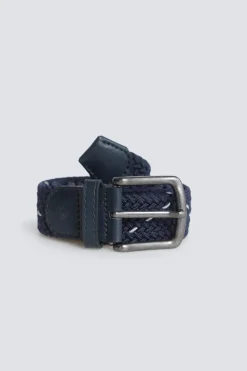 Cintur&oacute;n trenzado monocolor con cruz en contraste