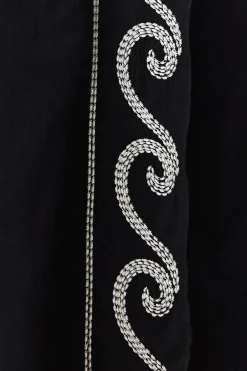 Conjunto top asim&eacute;trico y falda