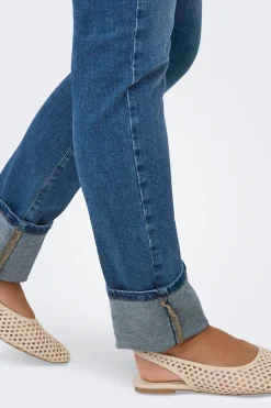 Jeans slim bajo vuelto