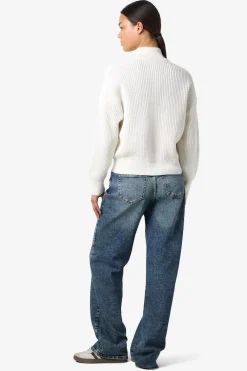 Jersey cuello alto cremallera bordado