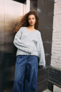 Jersey punto trenzado cuello pico