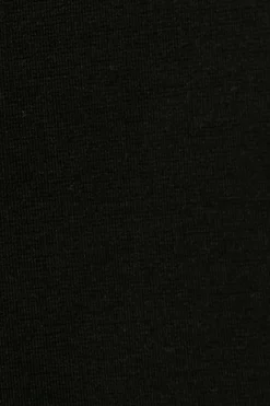 Leggings con abertura en la pierna y botones en la parte delantera