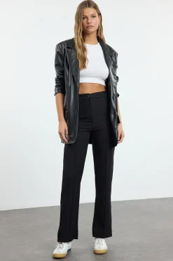 Pantal&oacute;n cintura alta