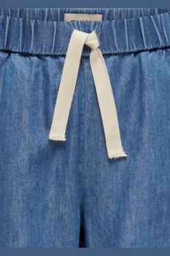 Pantal&oacute;n vaquero ancho con cintura fruncida y cord&oacute;n