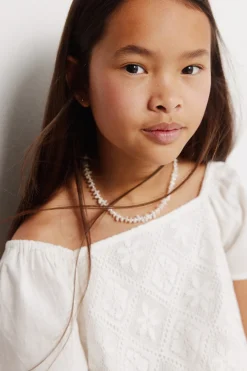 Peto bordado suizo ni&ntilde;a