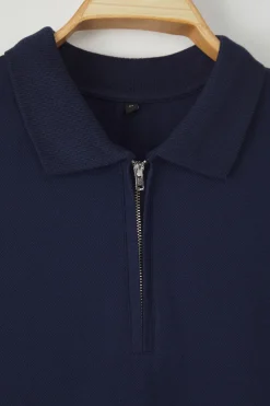 Polo de manga corta y cremallera