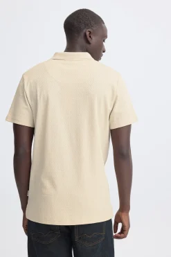 Polo de punto con cuello pico