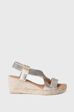 Sandalia de cuña metalizada con tiraselasticas