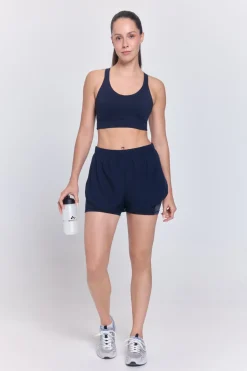 Short running deportivo reflectante