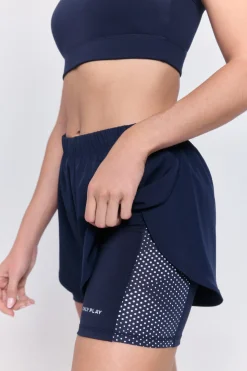 Short running deportivo reflectante