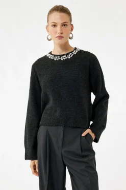 Su&eacute;ter de punto con efecto decorativo