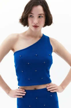 Top asim&eacute;trico