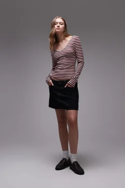 Top de punto de manga larga