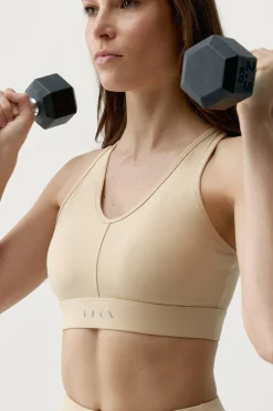 Top deportivo Deo beige