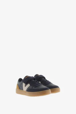 Zapatillas deportivas de ni&ntilde;os con piezas en contraste y cord&oacute;n el&aacute;stico