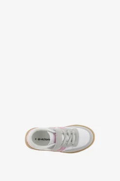 Zapatillas deportivas de ni&ntilde;os con piezas en contraste y cord&oacute;n el&aacute;stico